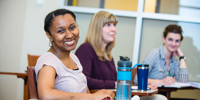 Grad students in classroom.