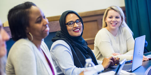 Grad students in classroom.