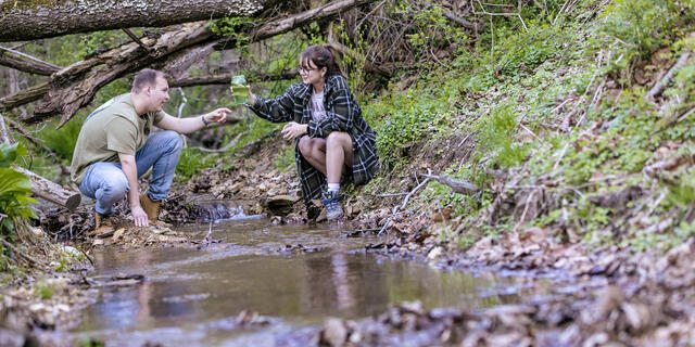 Students taking water samples at Singleton Matthews Farm.