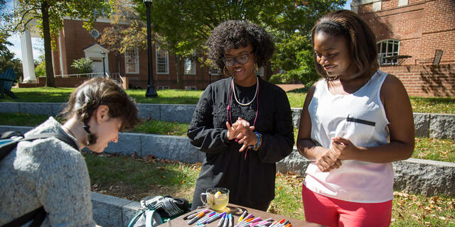 Students making Global Climate Change Week Light Switch Art