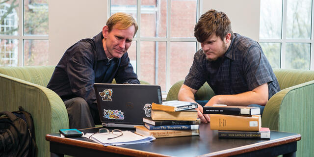 History professor Stephen Feeley and senior Josh Irvin