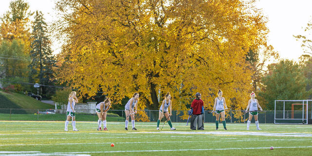 field hockey players on field