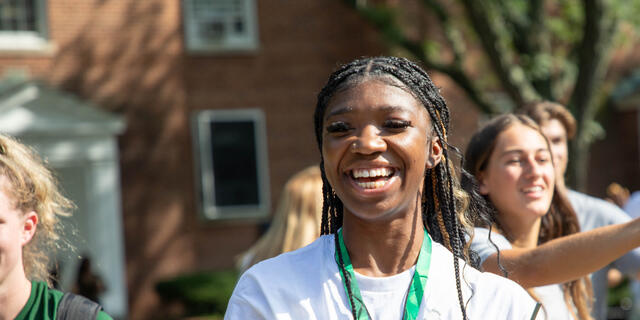 Students outdoors laughing